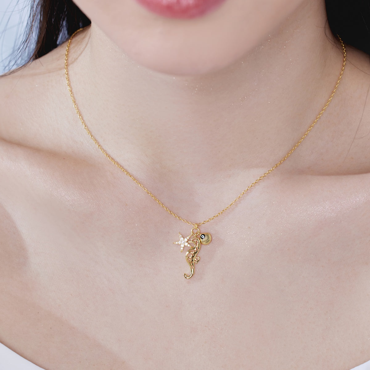 Summer Ocean Series: S925 Silver 18K Yellow Gold Plated Necklace with White Zircon Starfish, Seahorse, Hollow Shell, and Evil Eye Design