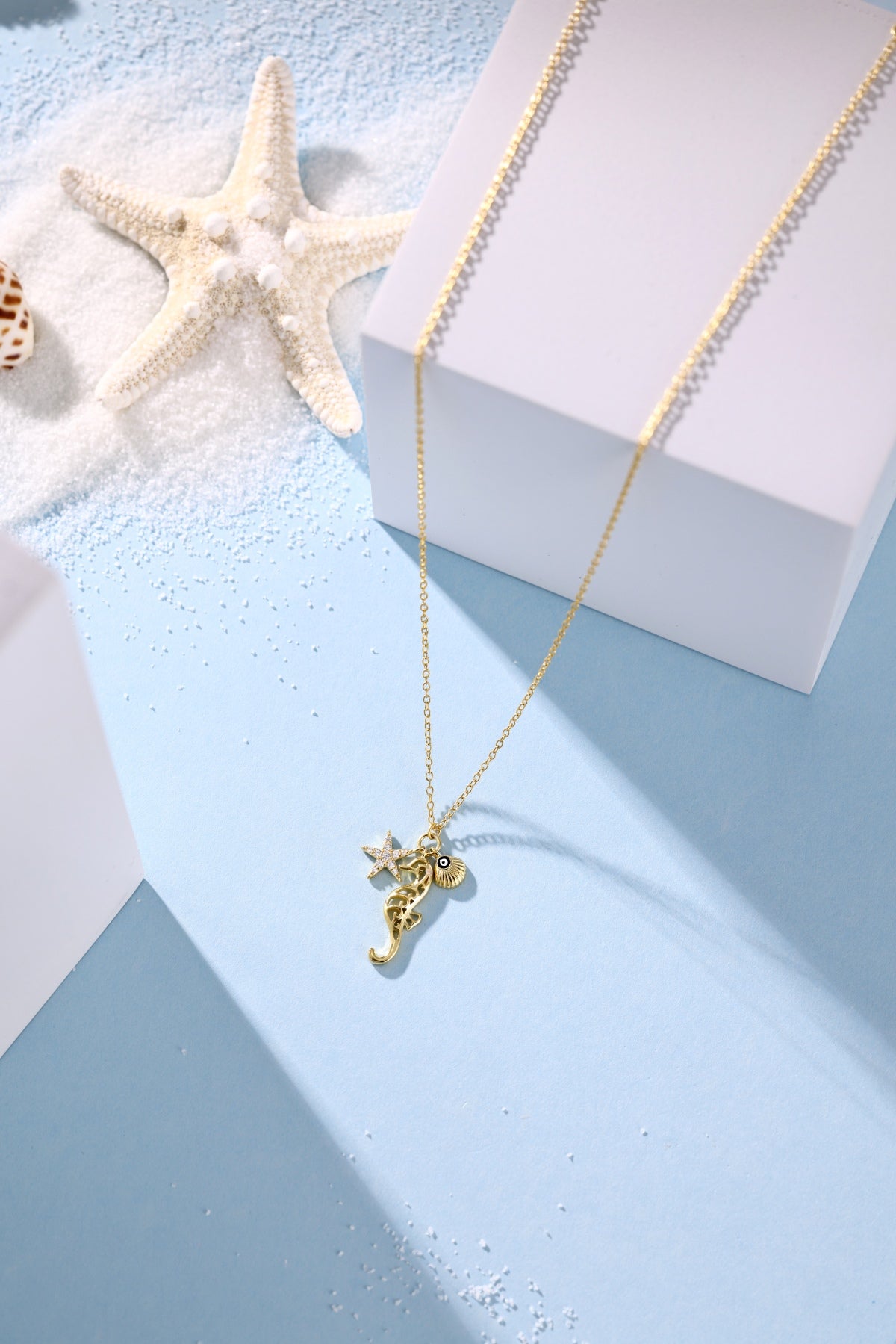 Summer Ocean Series: S925 Silver 18K Yellow Gold Plated Necklace with White Zircon Starfish, Seahorse, Hollow Shell, and Evil Eye Design