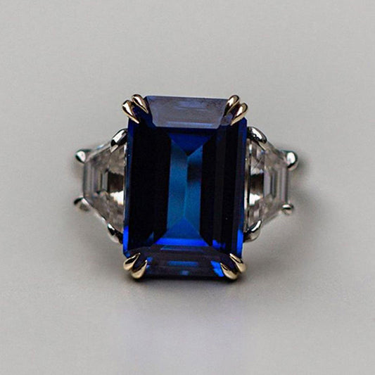 Luxurious Blue Sapphire Emerald Cut Three Stone Engagement Ring In Sterling Silver-Maxinejewelry