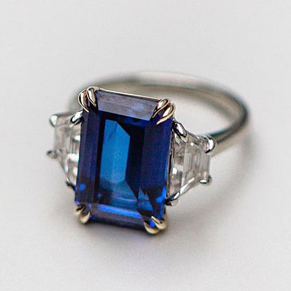 Luxurious Blue Sapphire Emerald Cut Three Stone Engagement Ring In Sterling Silver-Maxinejewelry