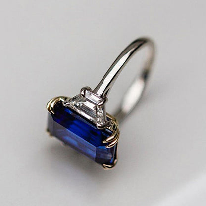 Luxurious Blue Sapphire Emerald Cut Three Stone Engagement Ring In Sterling Silver-Maxinejewelry