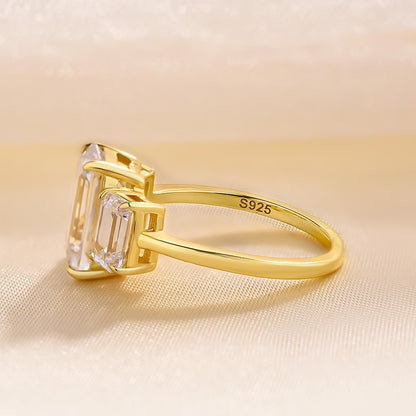 Stunning Yellow Gold Emerald Cut Three Stone Engagement Ring In Sterling Silver