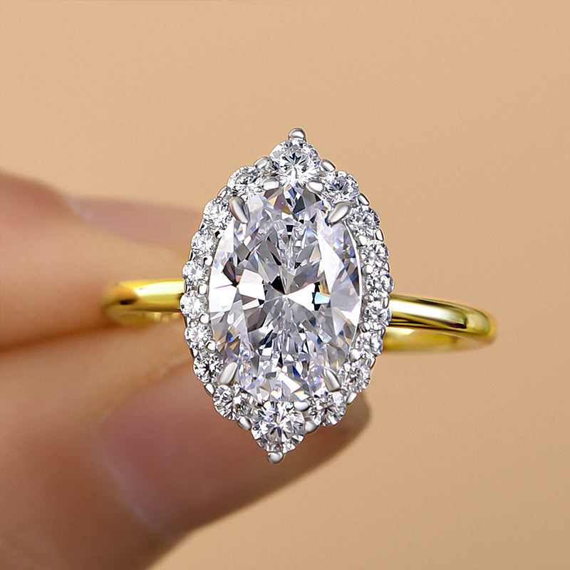 Exclusive Two-Tone Halo Oval Cut Engagement Ring