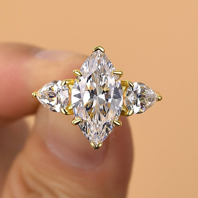 Noble Yellow Gold Three Stone Marquise Cut Engagement Ring