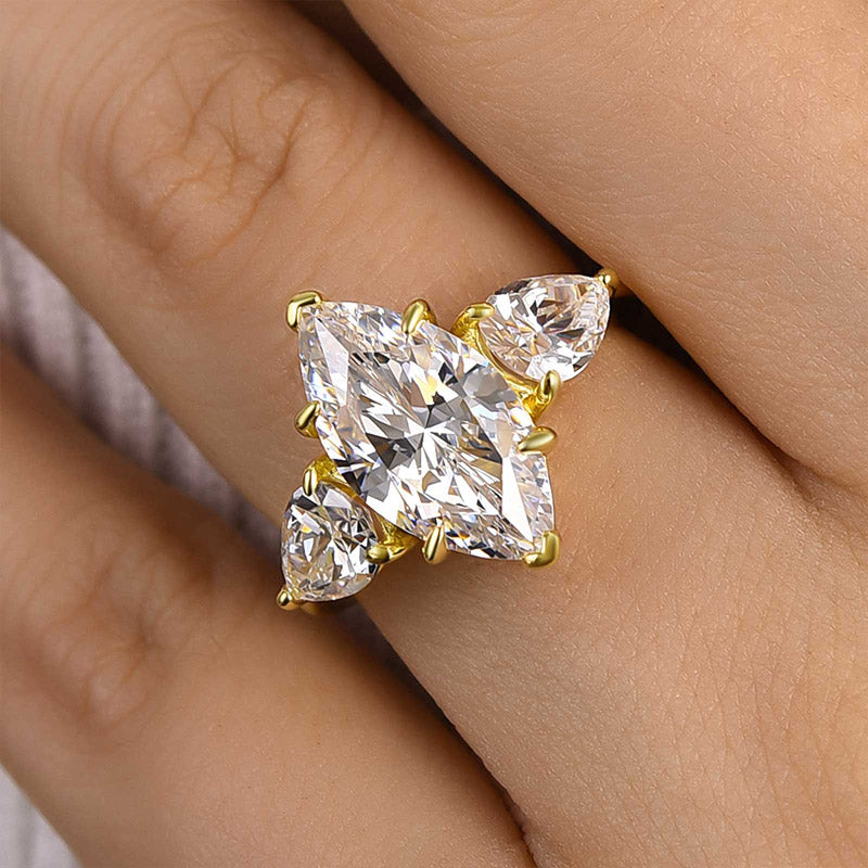 Noble Yellow Gold Three Stone Marquise Cut Engagement Ring