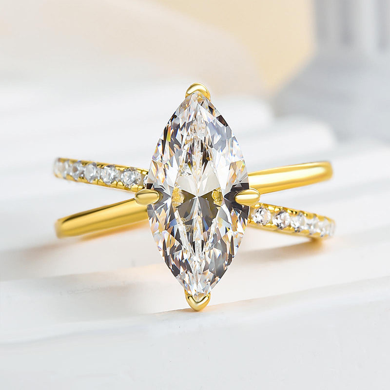 Unique Yellow Gold Cross Shank Marquise Cut Engagement Ring