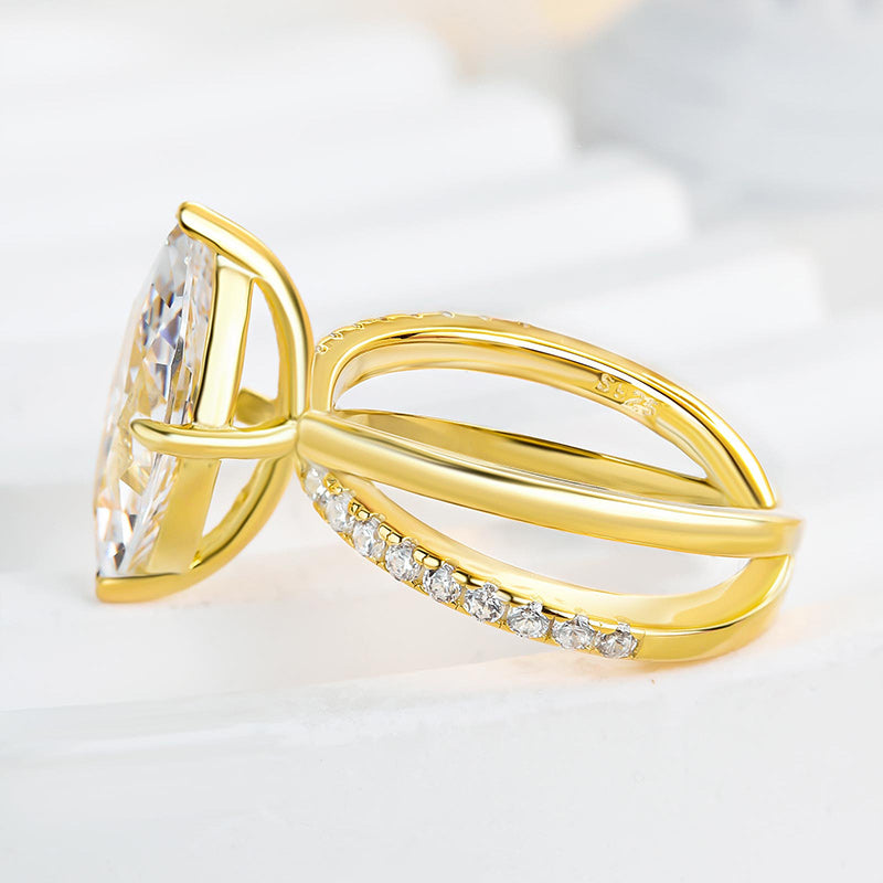 Unique Yellow Gold Cross Shank Marquise Cut Engagement Ring