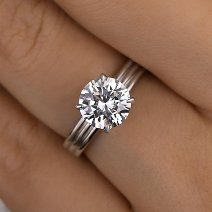 Exclusive Three Shank Round Cut Engagement Ring