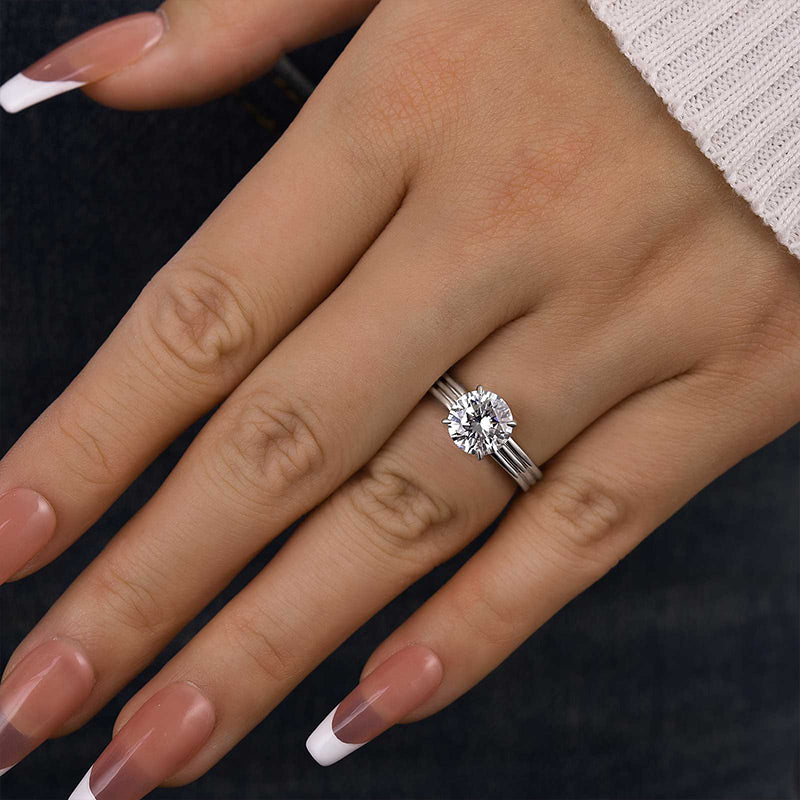 Exclusive Three Shank Round Cut Engagement Ring