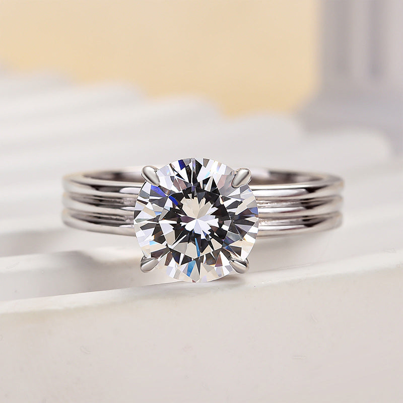 Exclusive Three Shank Round Cut Engagement Ring