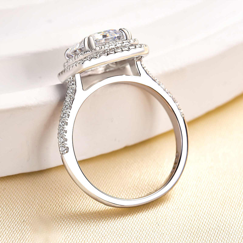 Attractive Double Halo Emerald Cut Engagement Ring