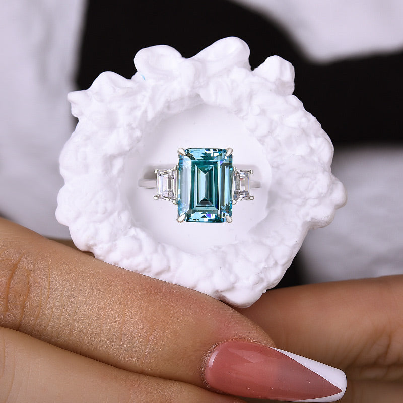 Exclusive Emerald Cut Three Stone Light Aquamarine Blue Engagement Ring In Sterling Silver