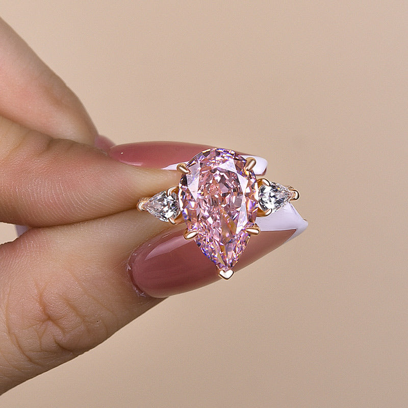 Elegant Rose Gold Pear Cut Pink Sapphire Three Stone Engagement Ring In Sterling Silver-Maxinejewelry