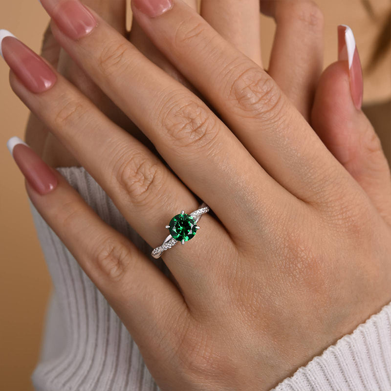 Twist Round Cut Emerald Green Engagement Ring In Sterling Silver