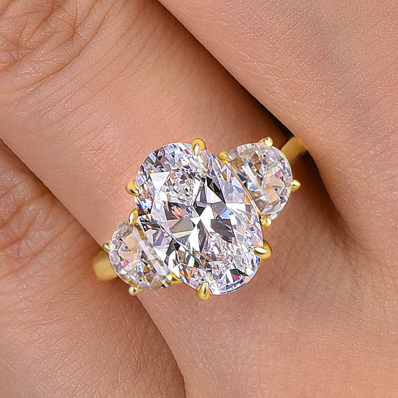 Exquisite Yellow Gold Oval Cut Three Stone Engagement Ring In Sterling Silver