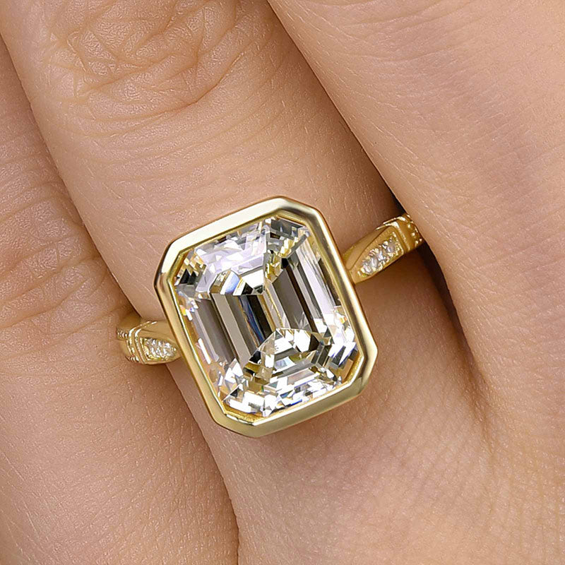 Luxurious Yellow Gold Emerald Cut Bezel Engagement Ring In Sterling Silver