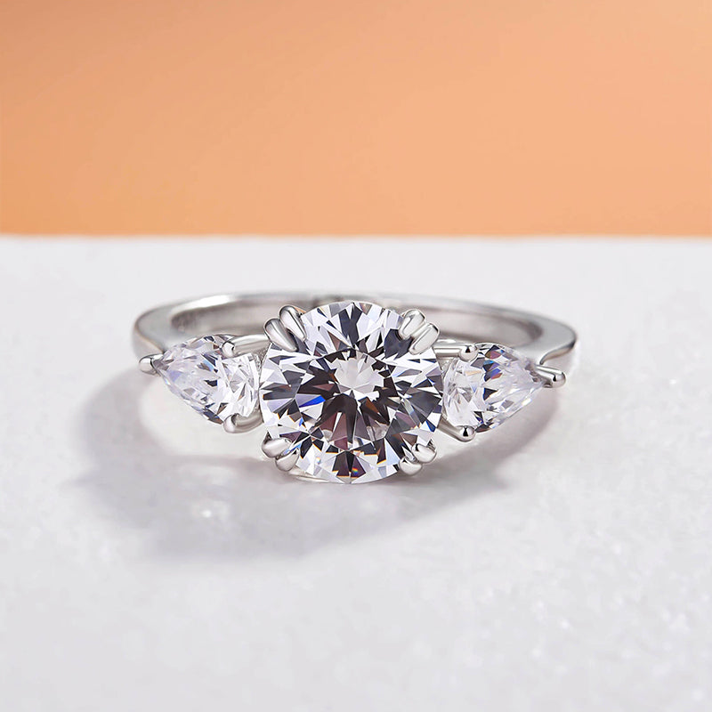 Exclusive Round Cut Three Stone Engagement Ring In Sterling Silver