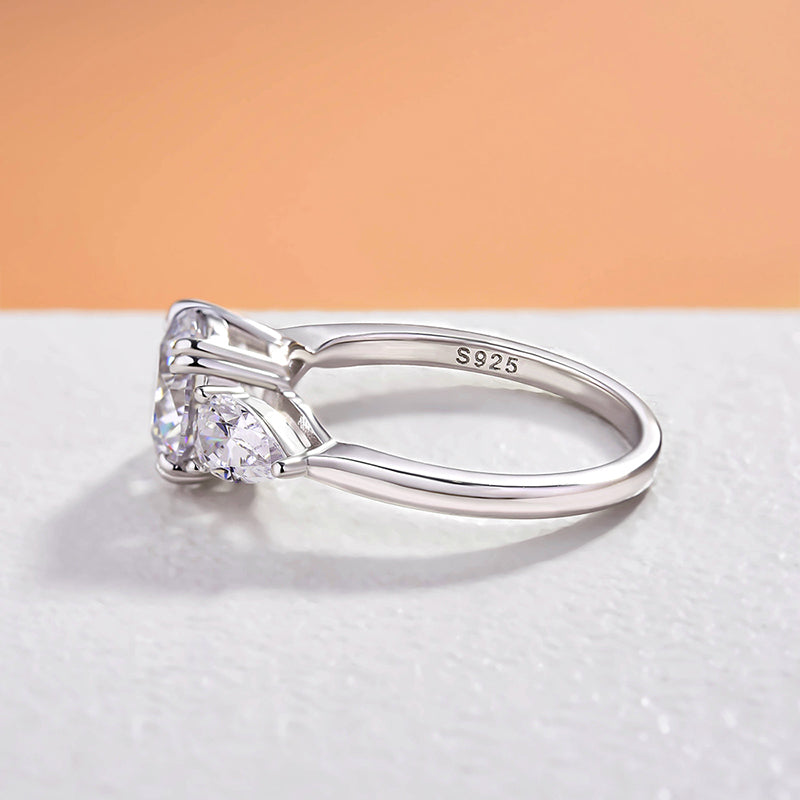 Exclusive Round Cut Three Stone Engagement Ring In Sterling Silver