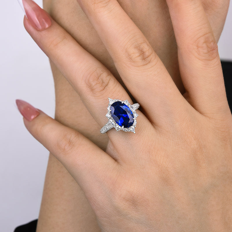 Gorgeous Halo Split Shank Oval Cut Blue Sapphire Engagement Ring In Sterling Silver