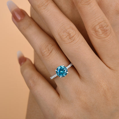 Elegant Round Cut Light Aquamarine Blue Engagement Ring In Sterling Silver