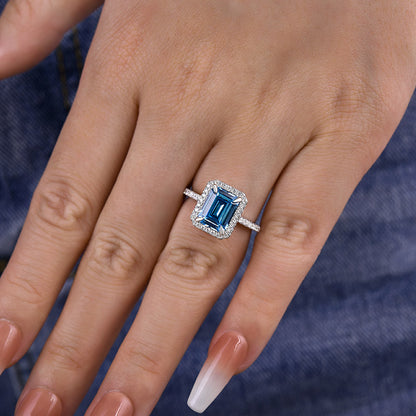 Halo Emerald Cut Light Aquamarine Blue Engagement Ring In Sterling Silver