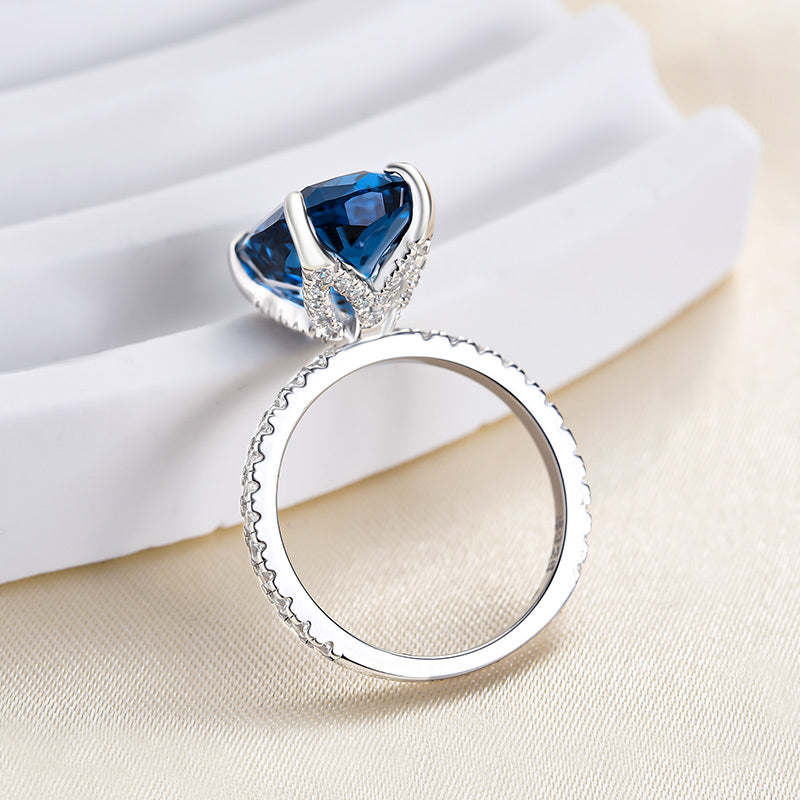 Exclusive Cushion Cut Montana Blue Sapphire Engagement Ring In Sterling Silver