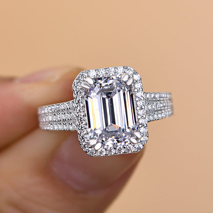 Excellent Halo Three Shank Emerald Cut Engagement Ring In Sterling Silver