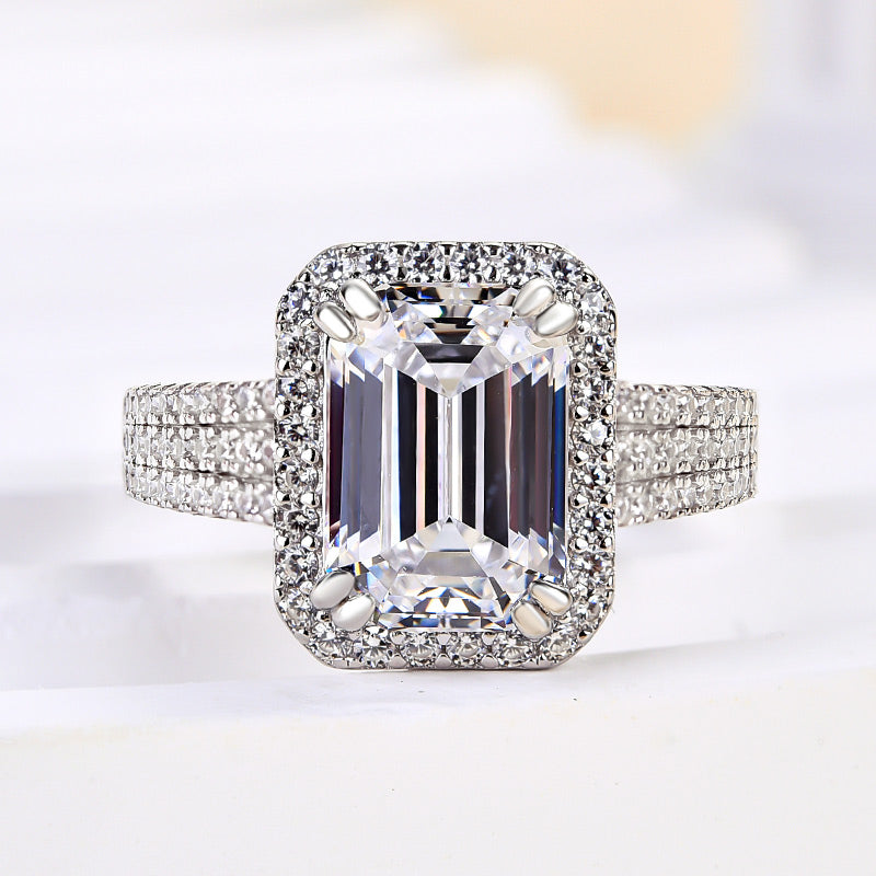 Excellent Halo Three Shank Emerald Cut Engagement Ring In Sterling Silver