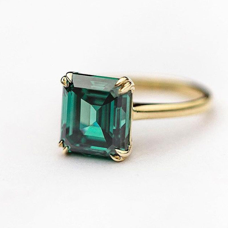 Excellent Yellow Gold Emerald Cut Engagement Ring In Sterling Silver