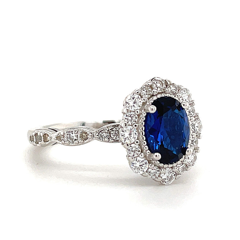 Noble Halo Oval Cut Blue Sapphire  Engagement Ring In Sterling Silver