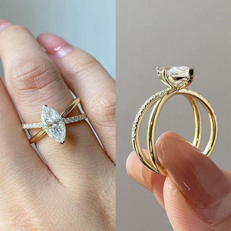 Unique Yellow Gold Cross Shank Marquise Cut Engagement Ring