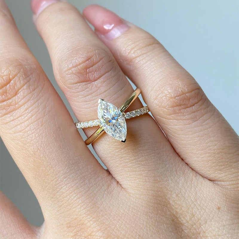 Unique Yellow Gold Cross Shank Marquise Cut Engagement Ring