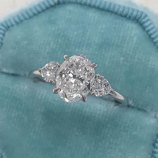 Elegant Oval Cut Three Stone Engagement Ring In Sterling Silver-Maxinejewelry