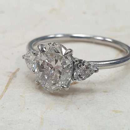 Elegant Oval Cut Three Stone Engagement Ring In Sterling Silver-Maxinejewelry