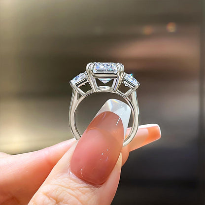 Luxurious Emerald Cut Three Stone Engagement Ring In Sterling Silver-Maxinejewelry