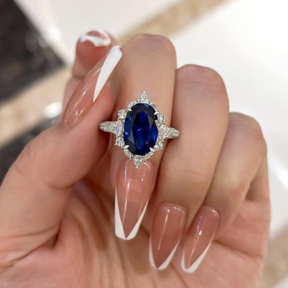 Gorgeous Halo Split Shank Oval Cut Blue Sapphire Engagement Ring In Sterling Silver-Maxinejewelry