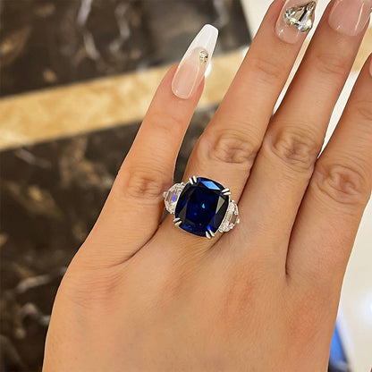 Gorgeous Blue Sapphire Cushion Cut Three Stone Engagement Ring In Sterling Silver