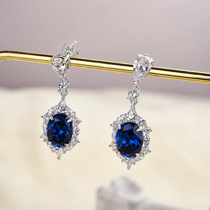 Luxurious Halo Oval Cut Blue Sapphire Women's Earrings In Sterling Silver