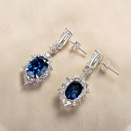 Luxurious Halo Oval Cut Blue Sapphire Women's Earrings In Sterling Silver