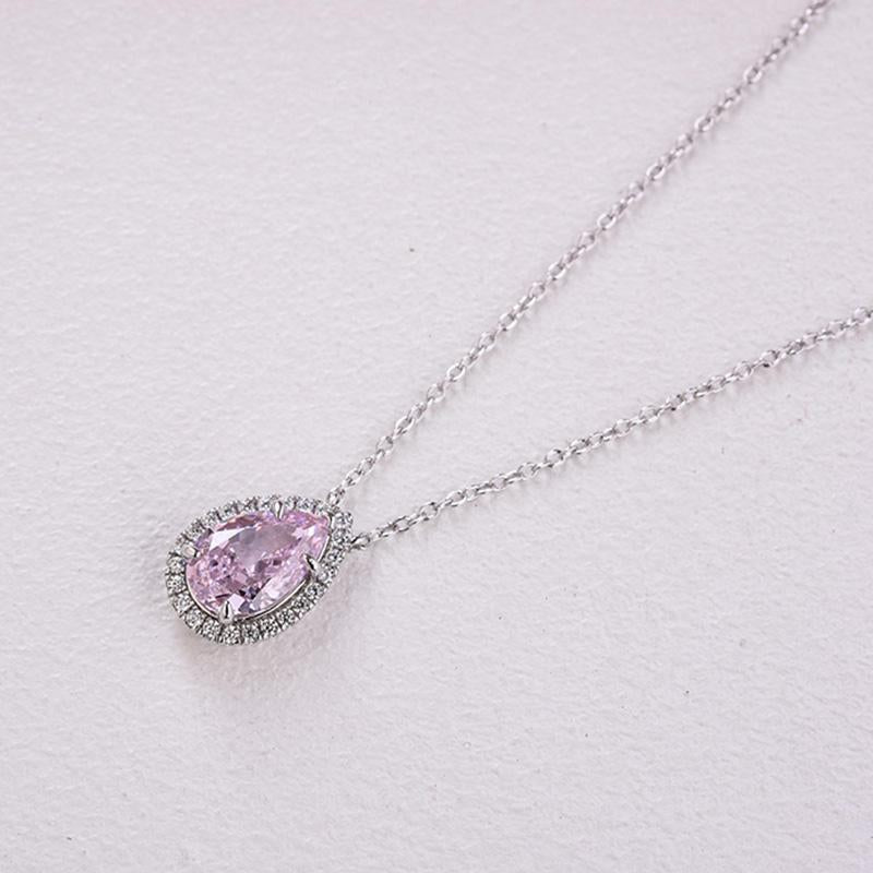 Elegant Halo Pear Cut Pink Sapphire Pendant with Necklace In Sterling Silver