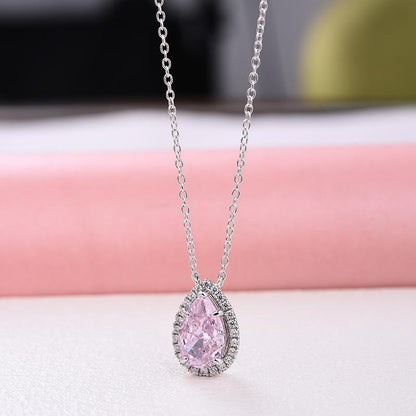 Elegant Halo Pear Cut Pink Sapphire Pendant with Necklace In Sterling Silver